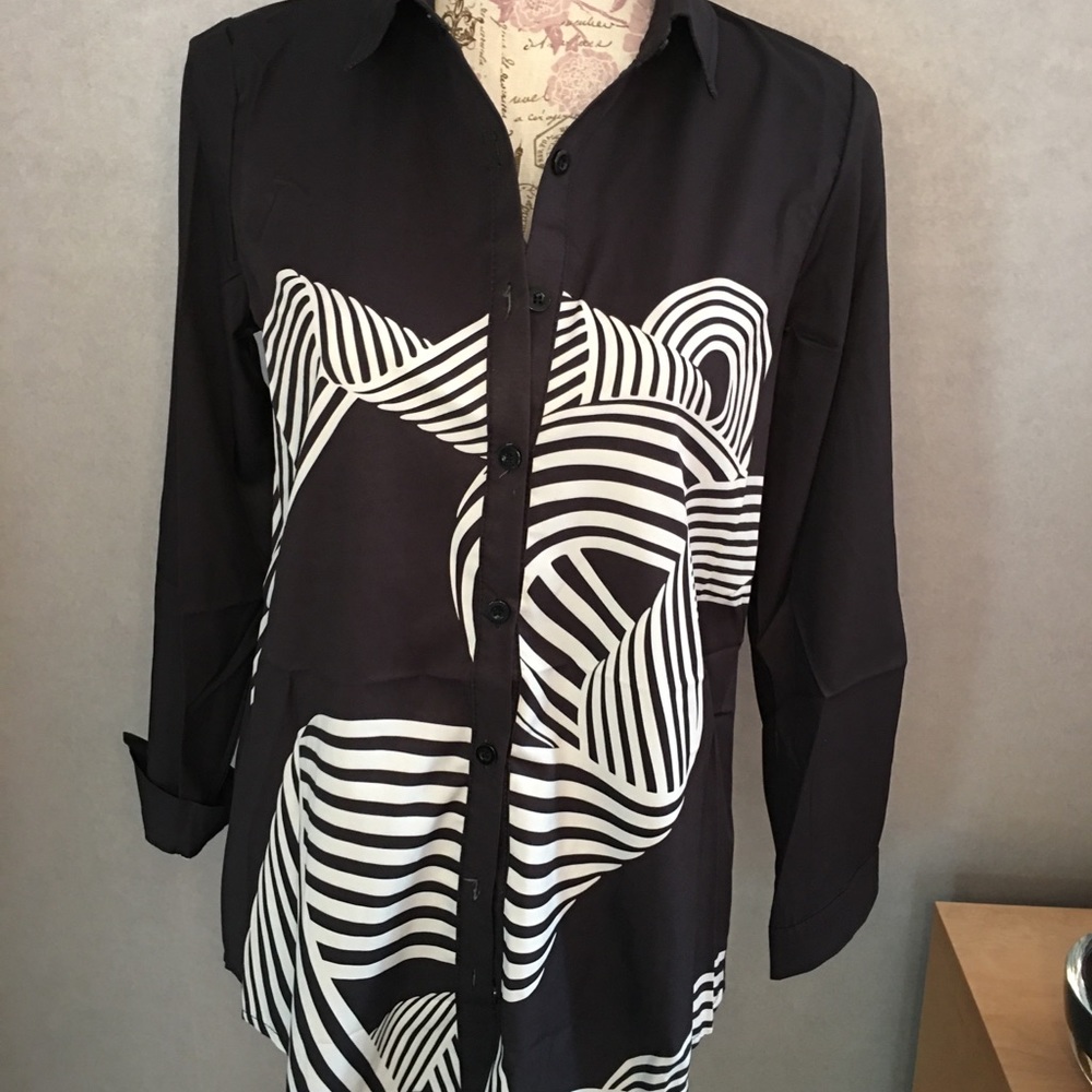 Shirt with black and white design.